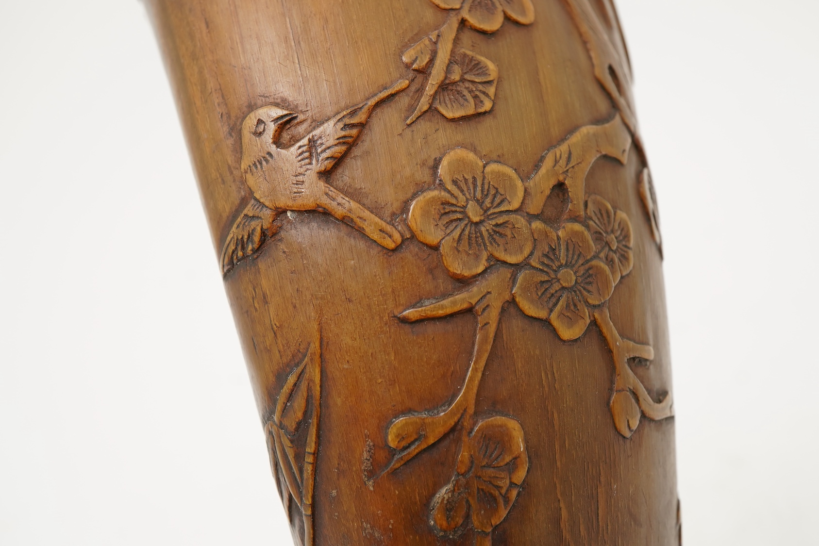 A Tibetan or Mongolian inscribed buffalo horn powder flask, 18th century
